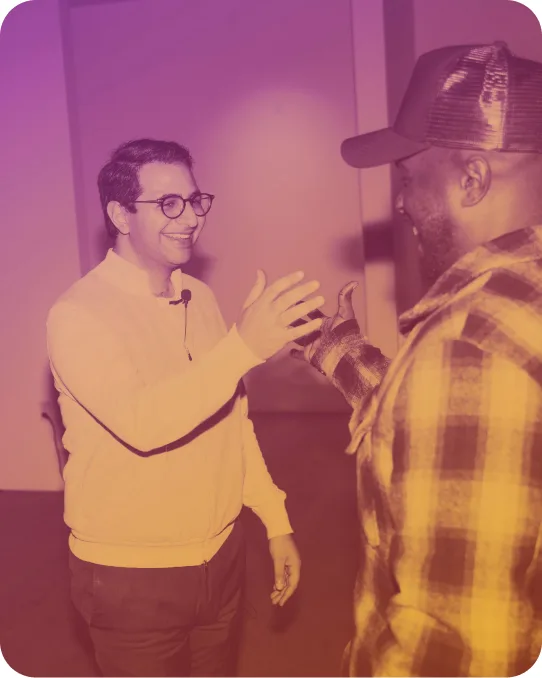 Two people in conversation after a talk
