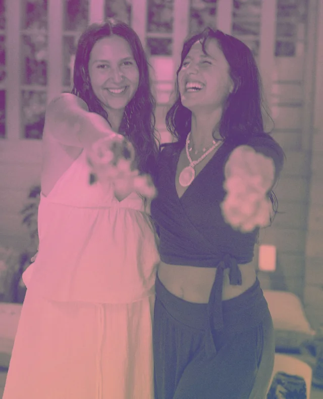 Two friends laughing together